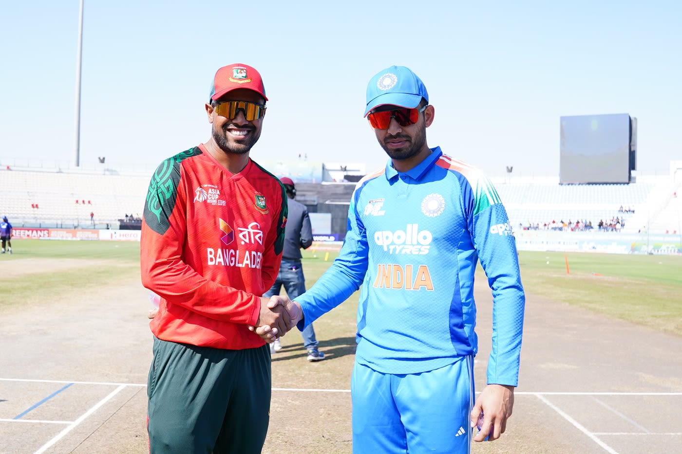 Akbar Ali and Jitesh Sharma at the toss