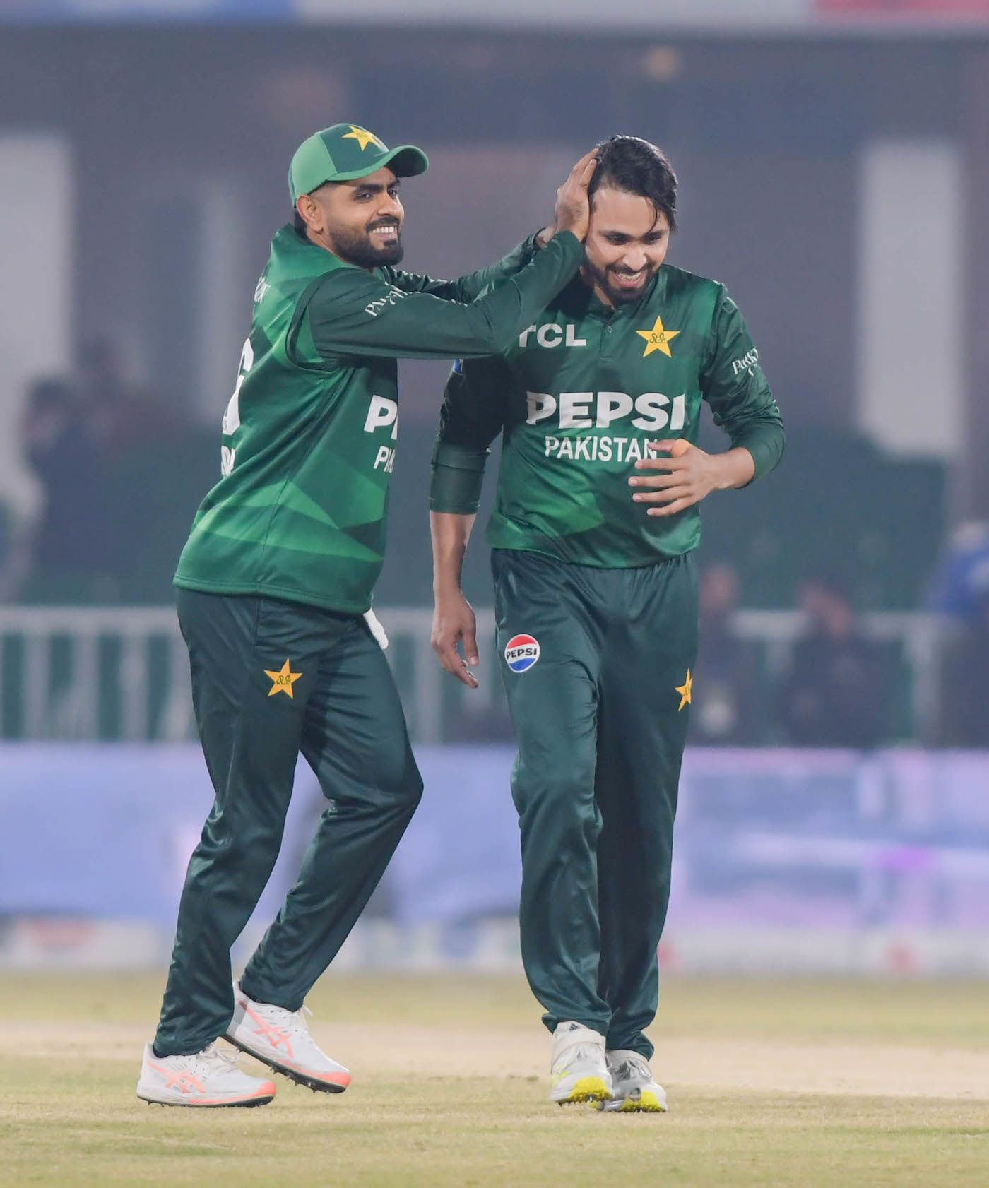 Babar Azam ruffles some joy into wicket-taker Faheem Ashraf's hair