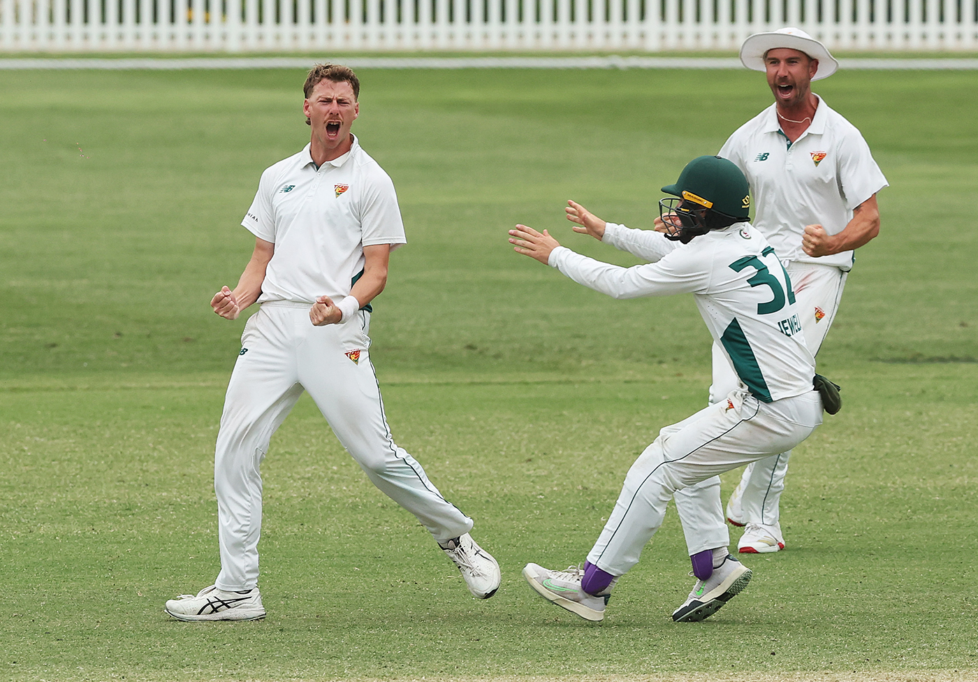Riley Meredith celebrates taking the match-winning wicket