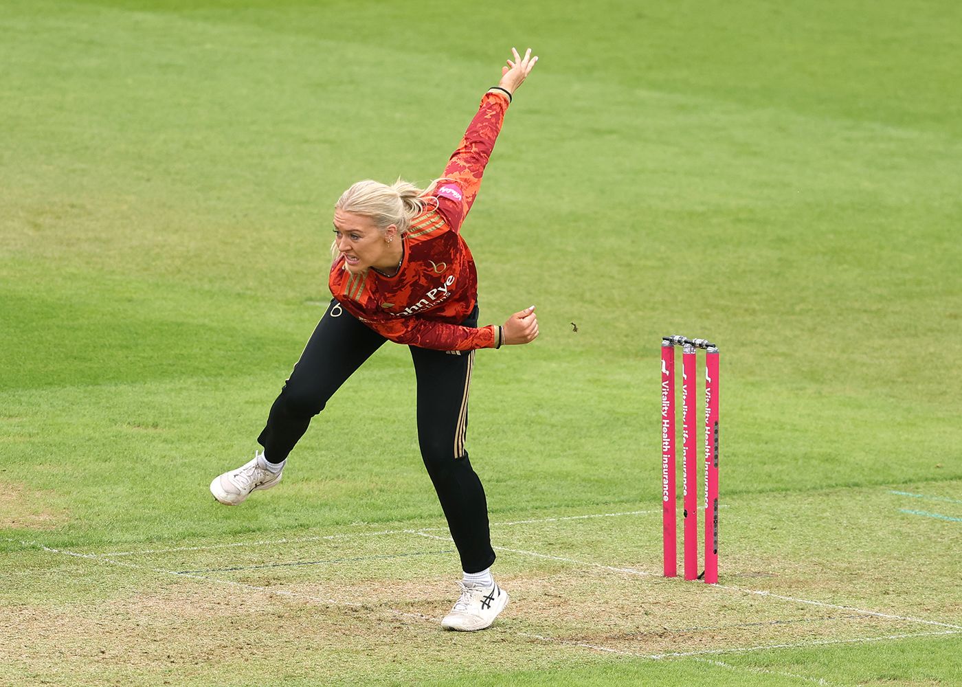 Sarah Glenn gets through the crease