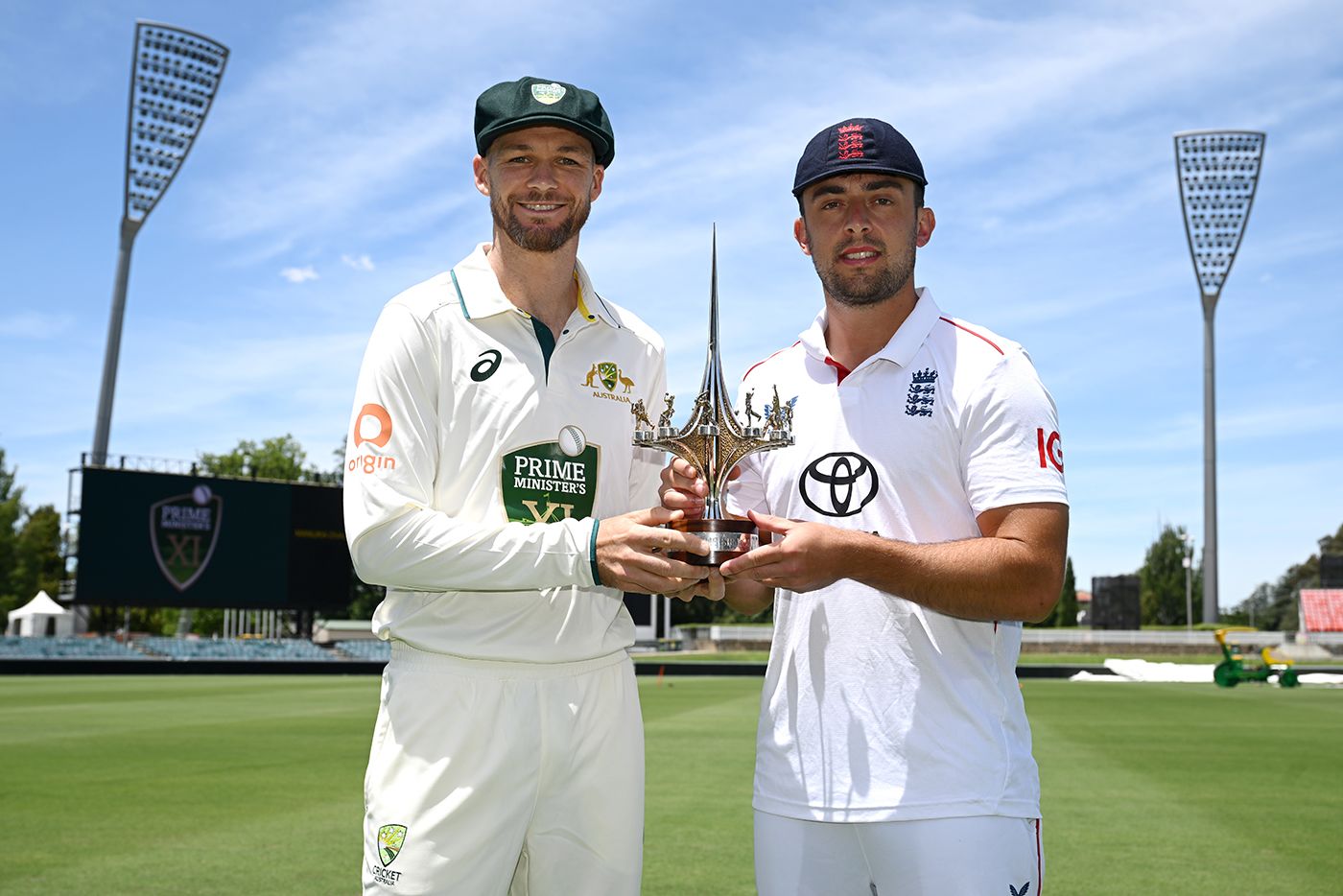 Peter Handscomb and Tom Haines pose with the trophy