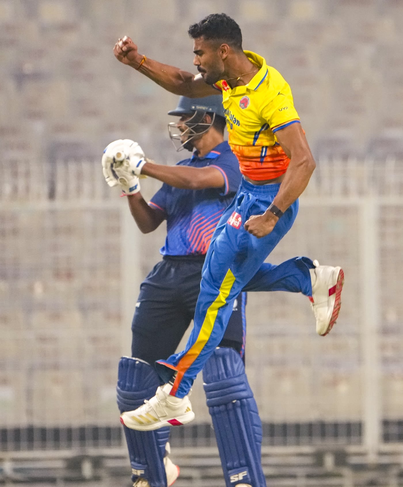 Rajvardhan Hangargekar celebrates a wicket