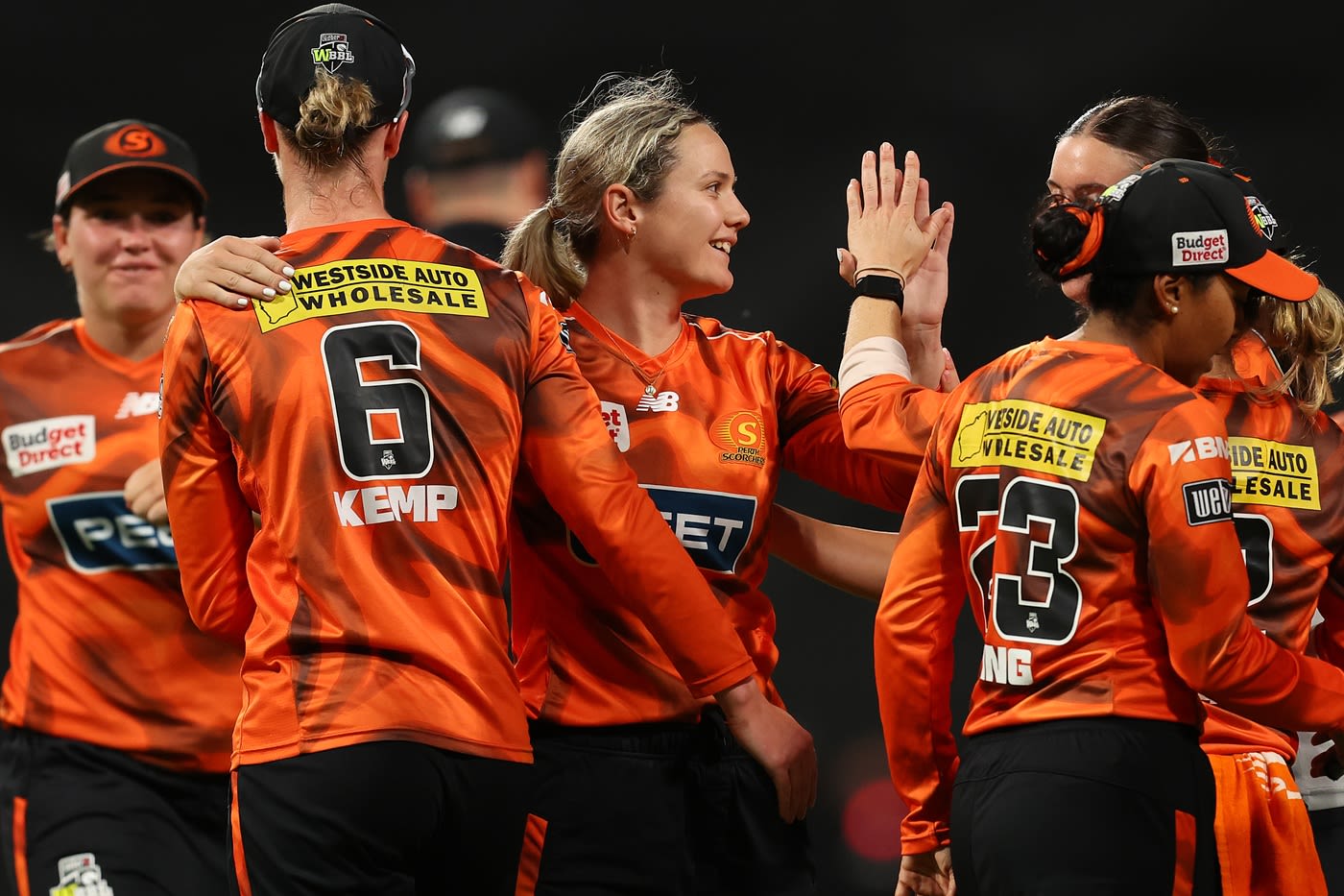Lilly Mills celebrates a wicket