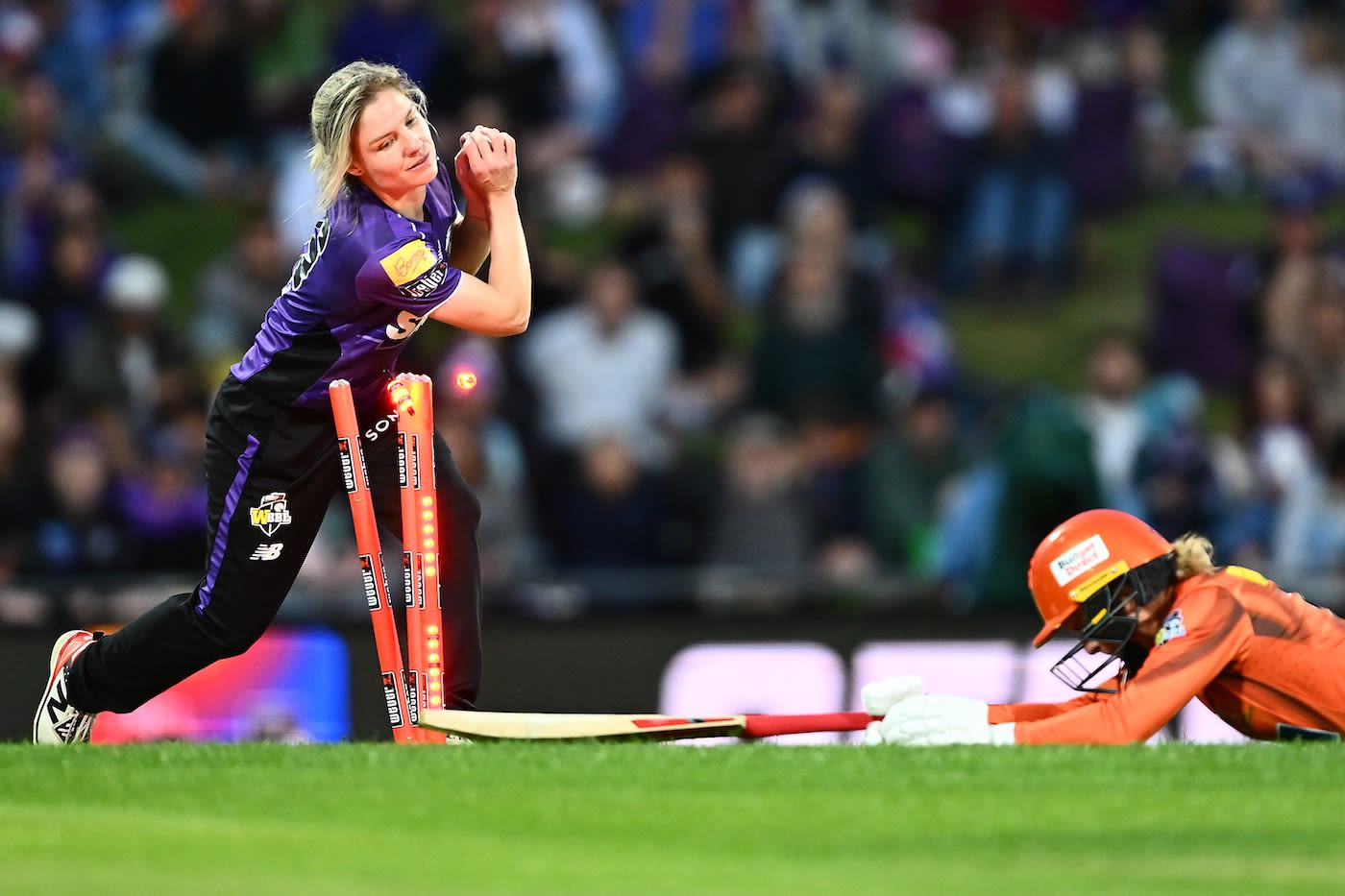 Nicola Carey attempts to run Paige Scholfield out
