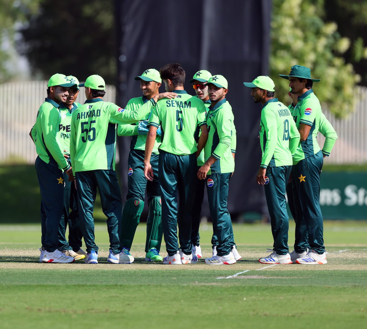 Mohammad Sayyam celebrates a wicket with his team-mates