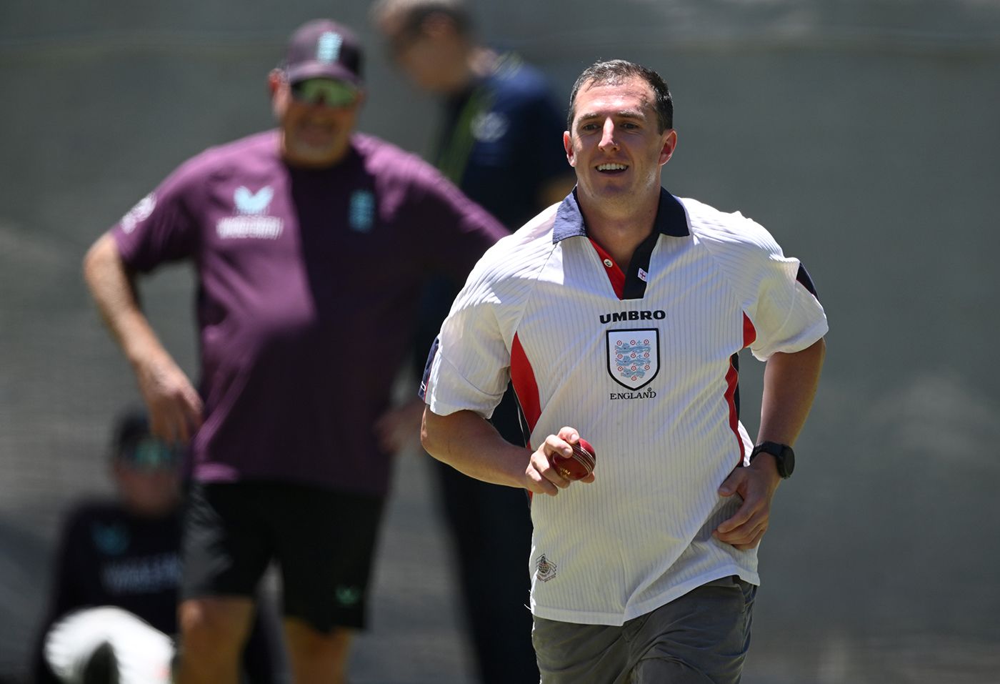 Dan Worrall bowled at England training wearing an England football shirt