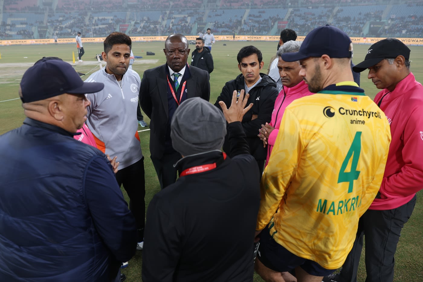 Gautam Gambhir, Suryakumar Yadav, Shukri Conrad and Aiden Markram along with the umpires in conversation with the local organisers