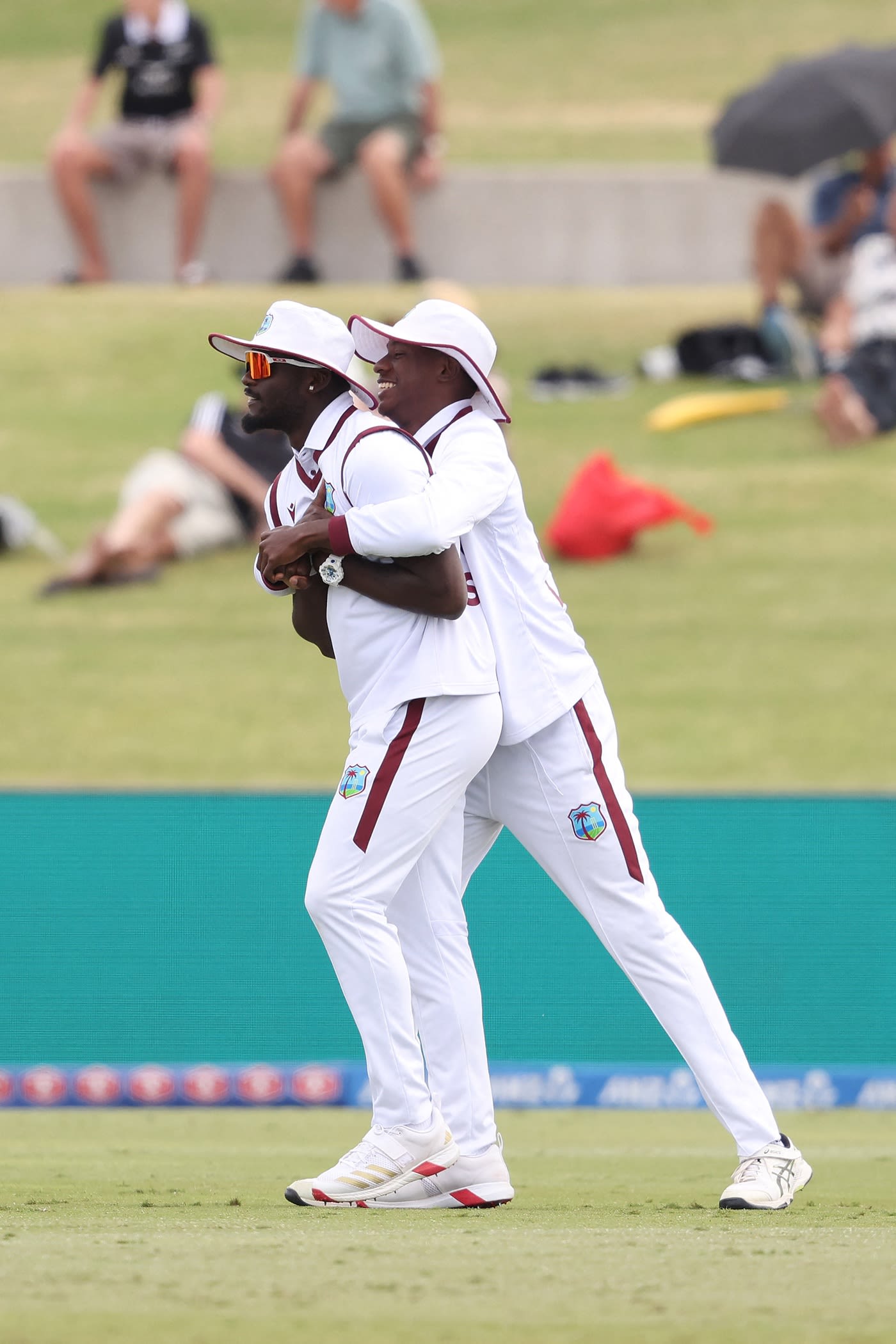 Jayden Seales and Johann Layne celebrate a catch