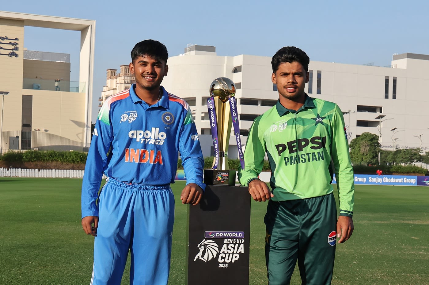 Ayush Mhatre and Farhan Yousaf pose with the trophy