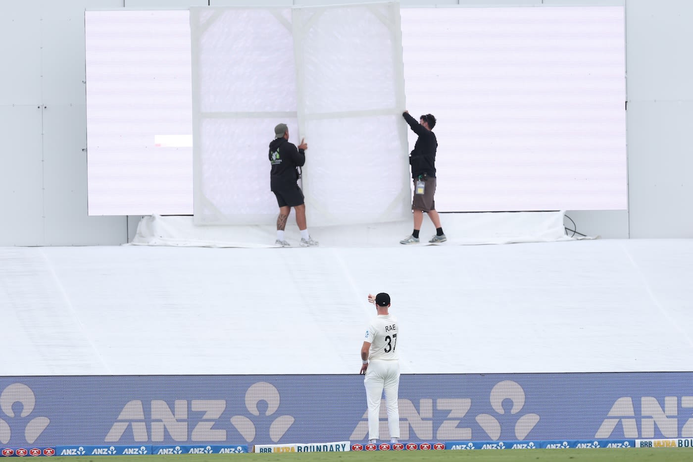 Michael Rae helps get the sight screen right