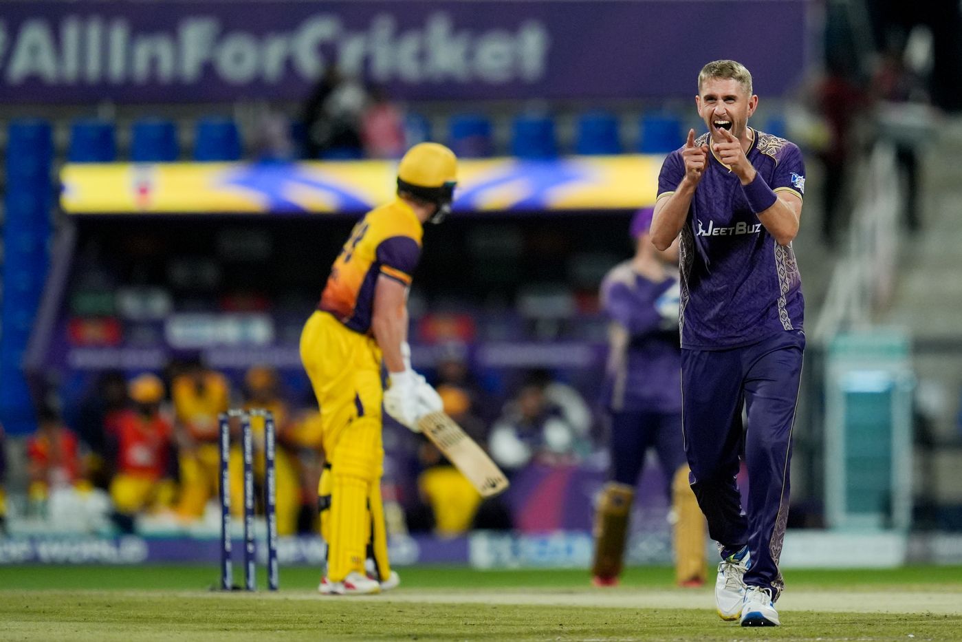 Olly Stone celebrates a wicket
