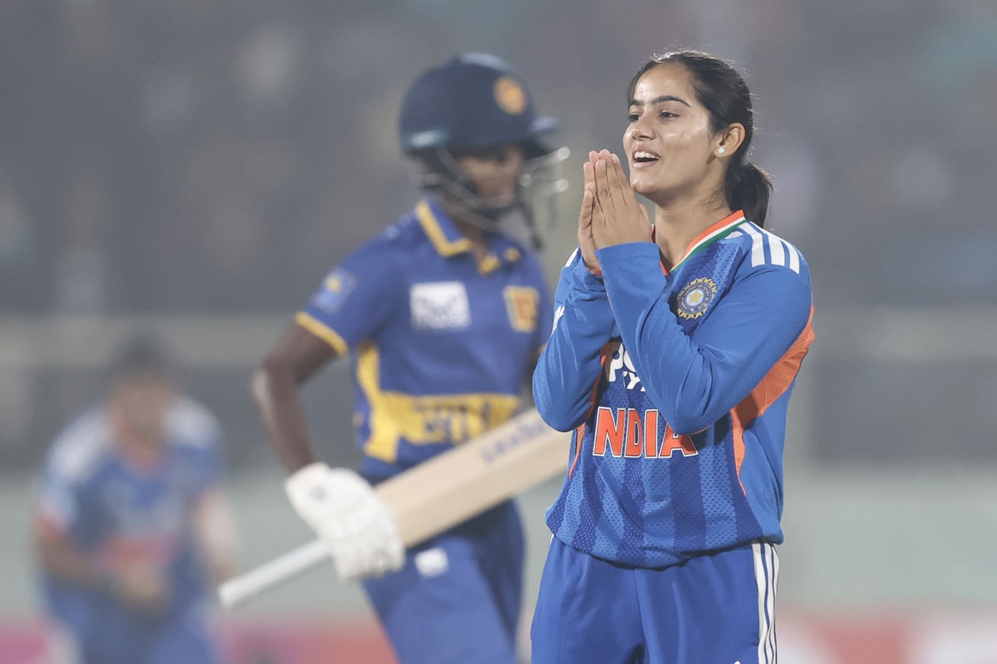 Vaishnavi Sharma reacts after picking up her first international wicket