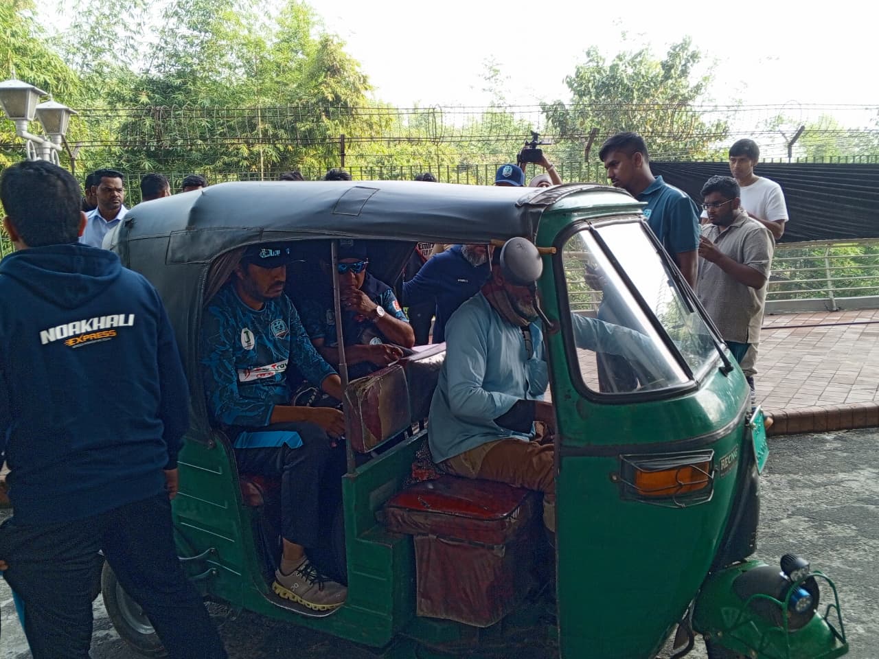 Khaled Mahmud and Talha Jubair leave the training session in an auto rickshaw