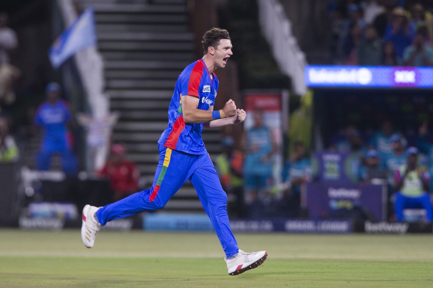 Eathan Bosch celebrates a wicket in the powerplay