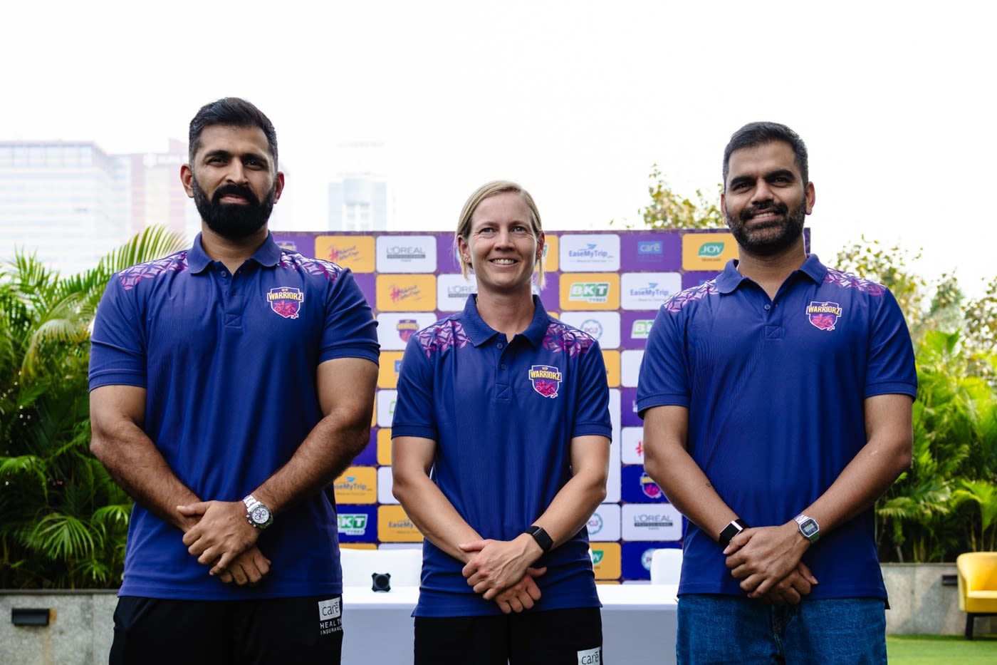 Meg Lanning with UP Warriorz head coach Abhishek Nayar and COO Kshemal Waingankar
