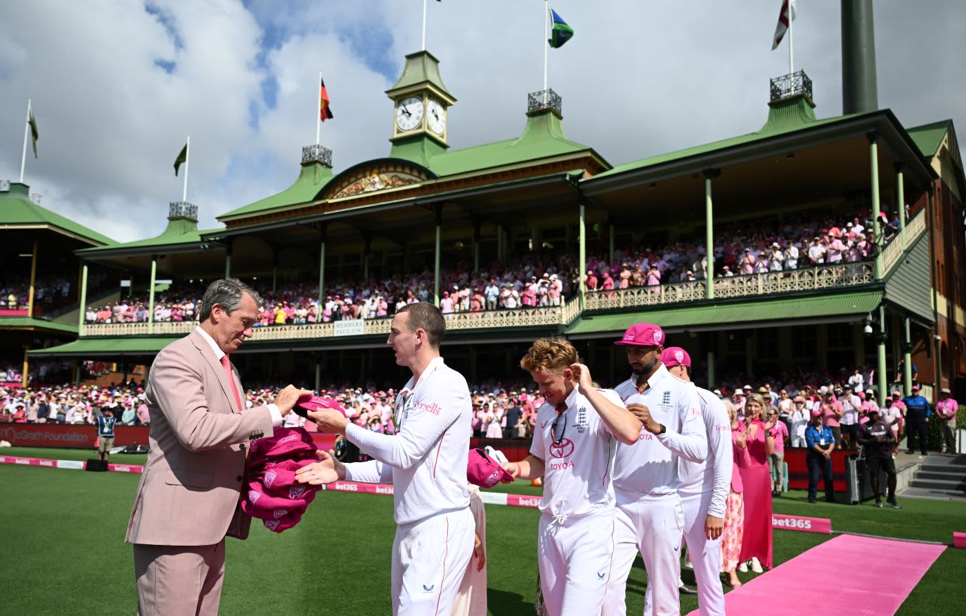 England players present signed pink caps to Glenn McGrath