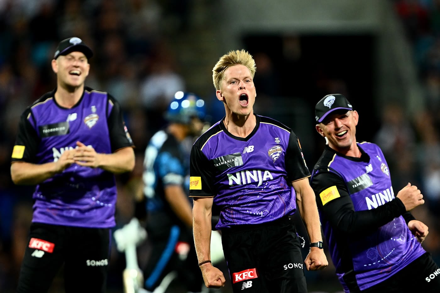 Nathan Ellis charges ahead after picking up a wicket