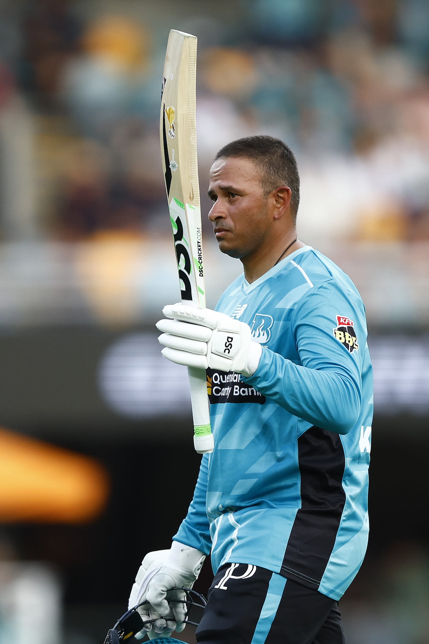 Usman Khawaja walks off after being dismissed for 78