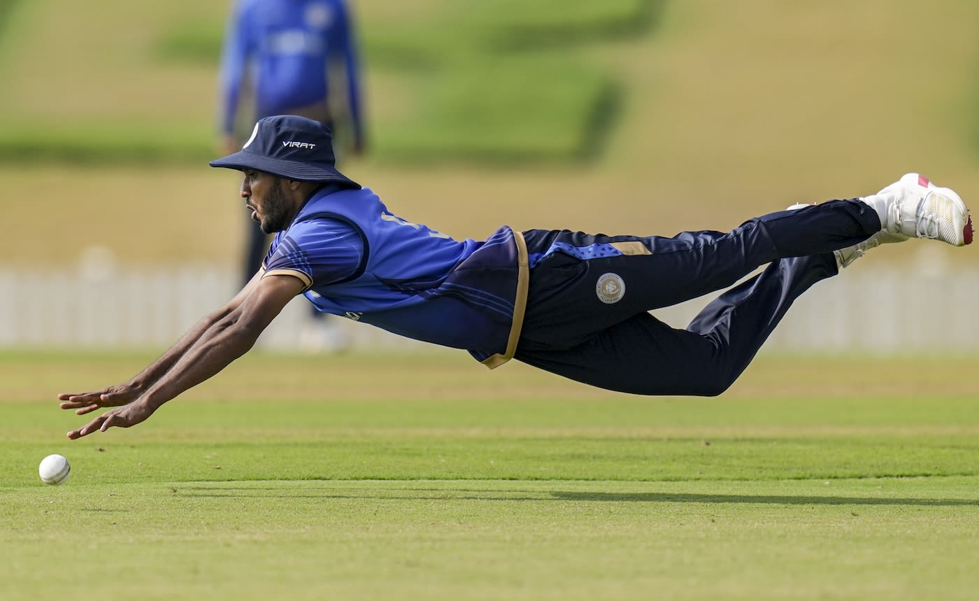 Chetan Sakariya puts in a dive to stop the ball