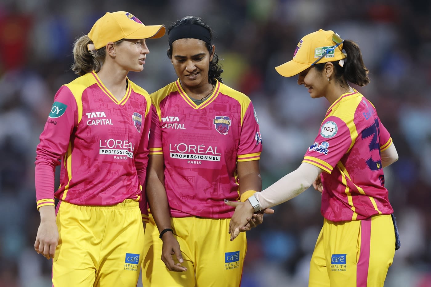 Meg Lanning, Shikha Pandey and Harleen Deol celebrate after Pandey had Amanjot Kaur caught and bowled