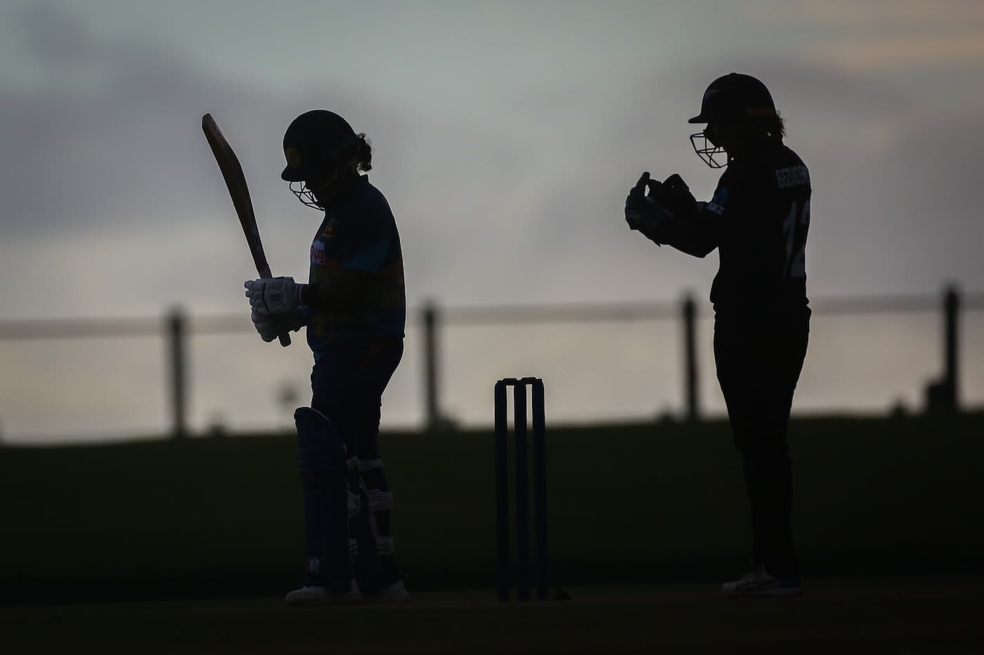 Chamari Athapaththu and Bernadine Bezuidenhout are seen in silhouette