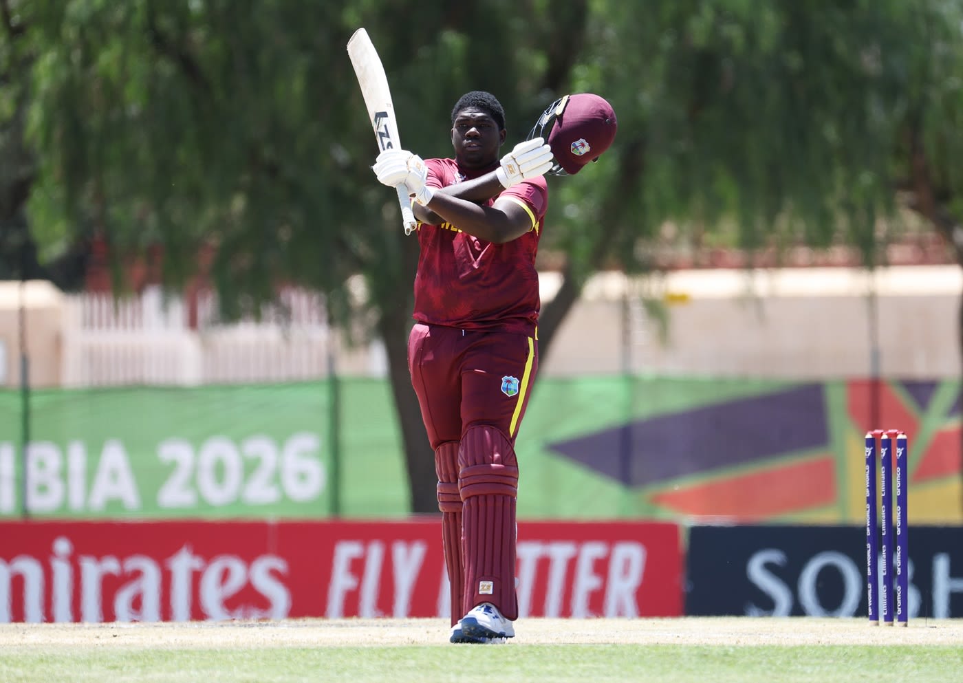 Zachary Carter celebrates his hundred