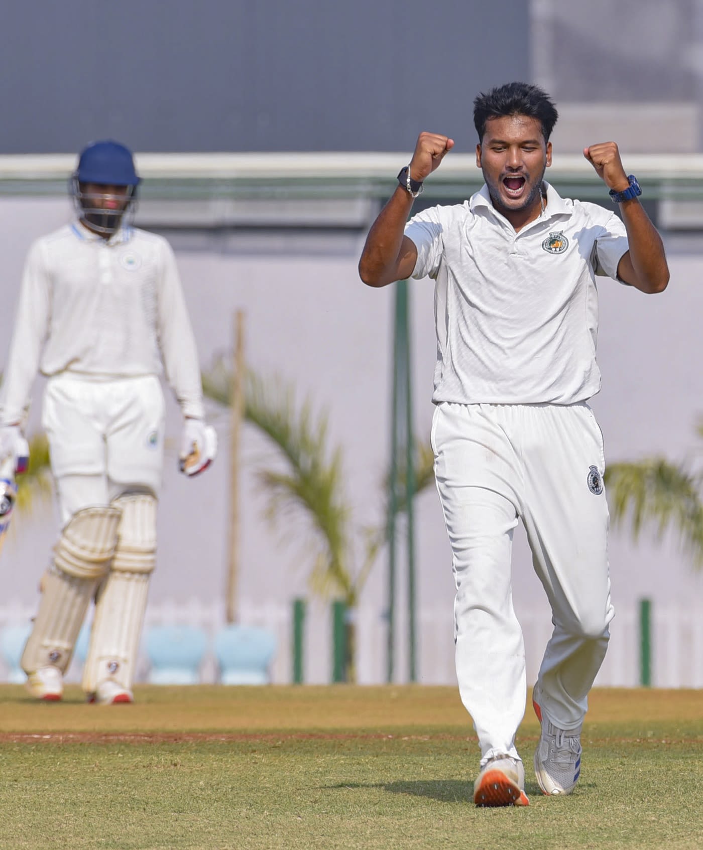 Mukhtar Hussain celebrates the wicket of Anuj Thakral