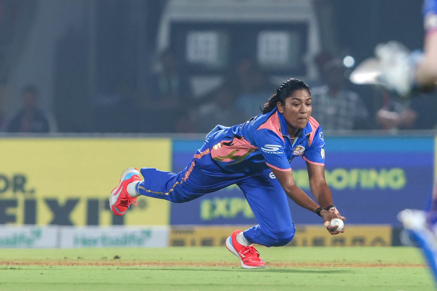 S Sajana pulled off a diving catch to dismiss Beth Mooney