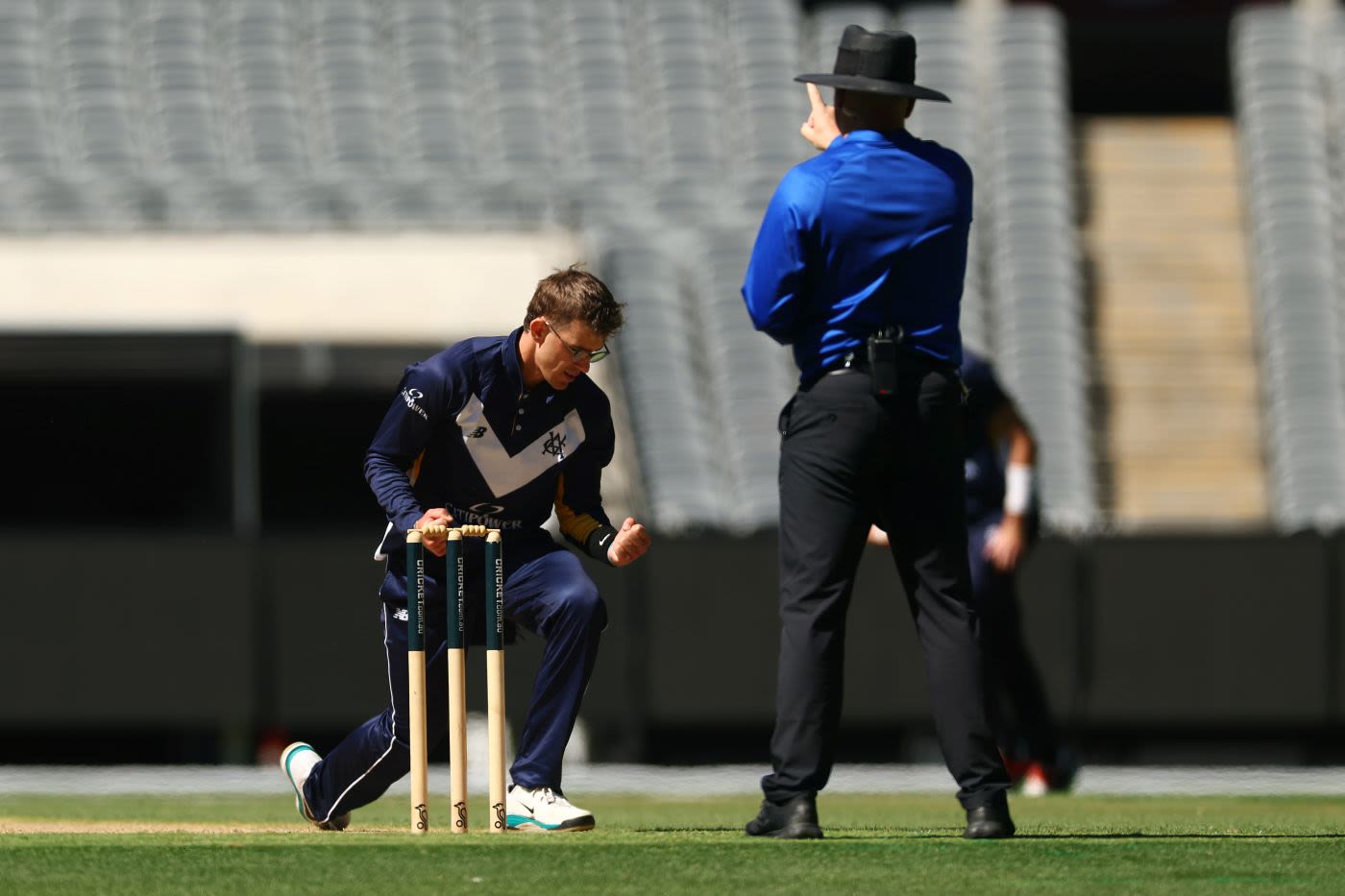Todd Murphy celebrates a wicket
