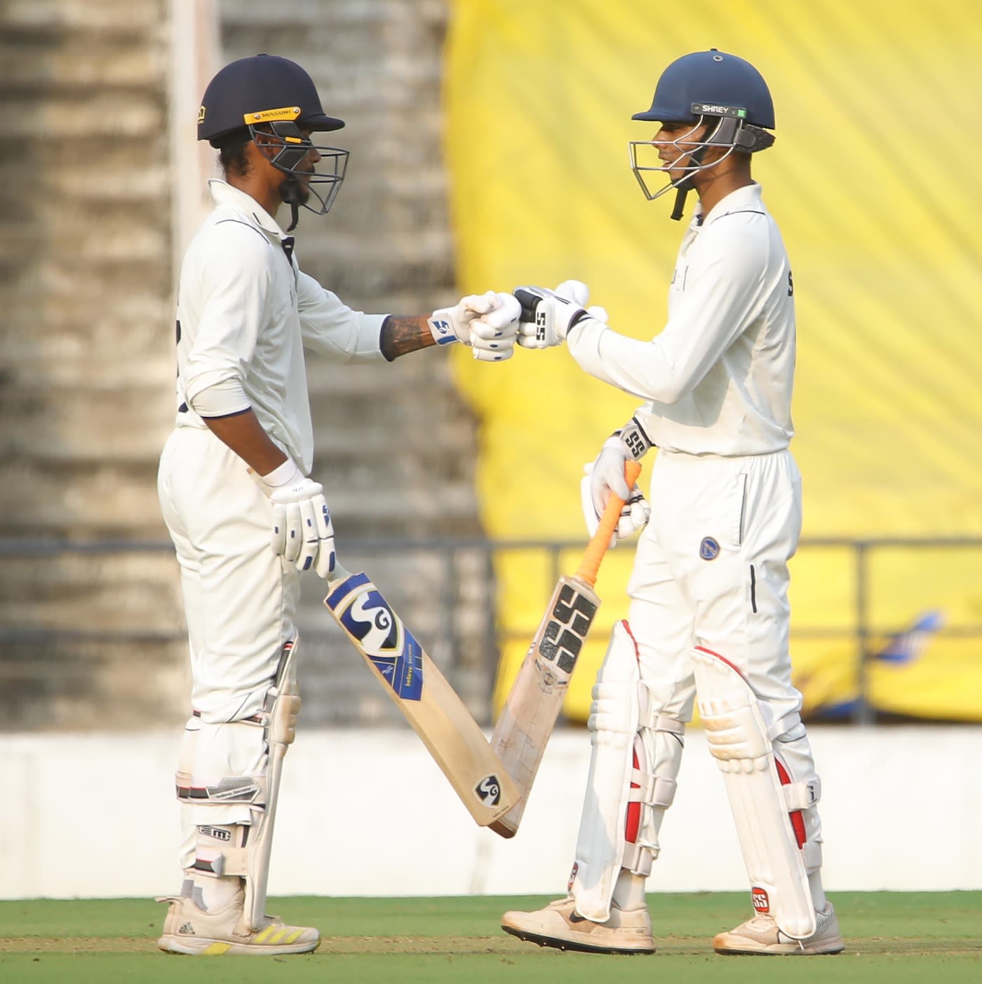 Shikhar Mohan and Sharandeep Singh bump gloves