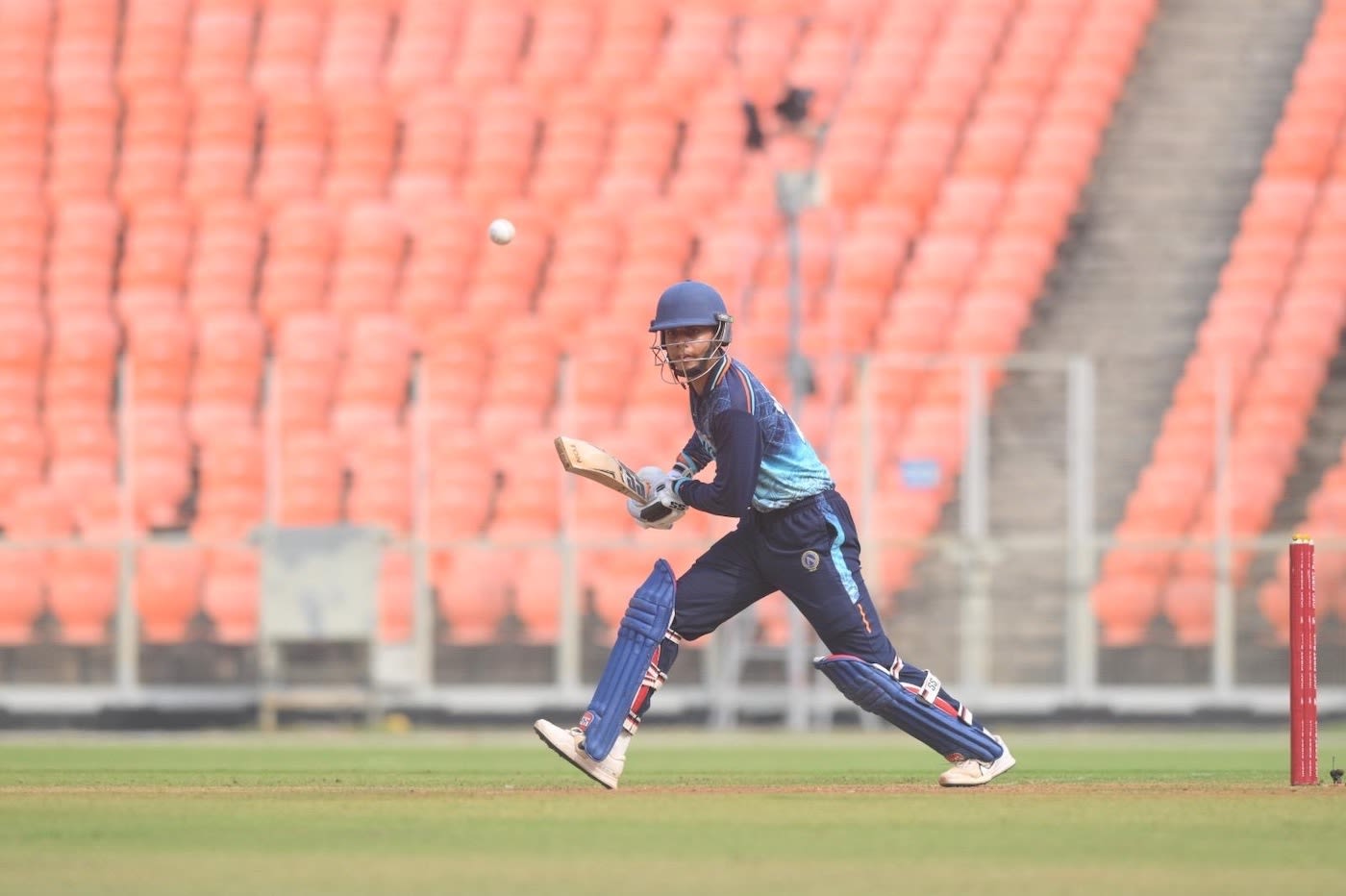 Shikhar Mohan hits the ball towards cover