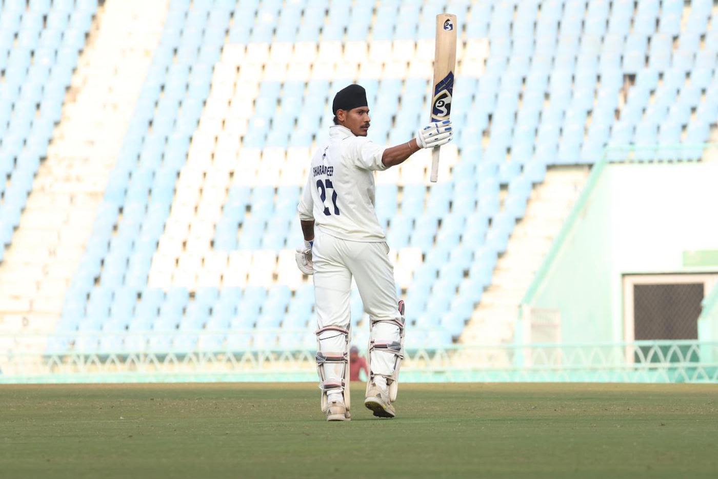 Sharandeep Singh celebrates his century