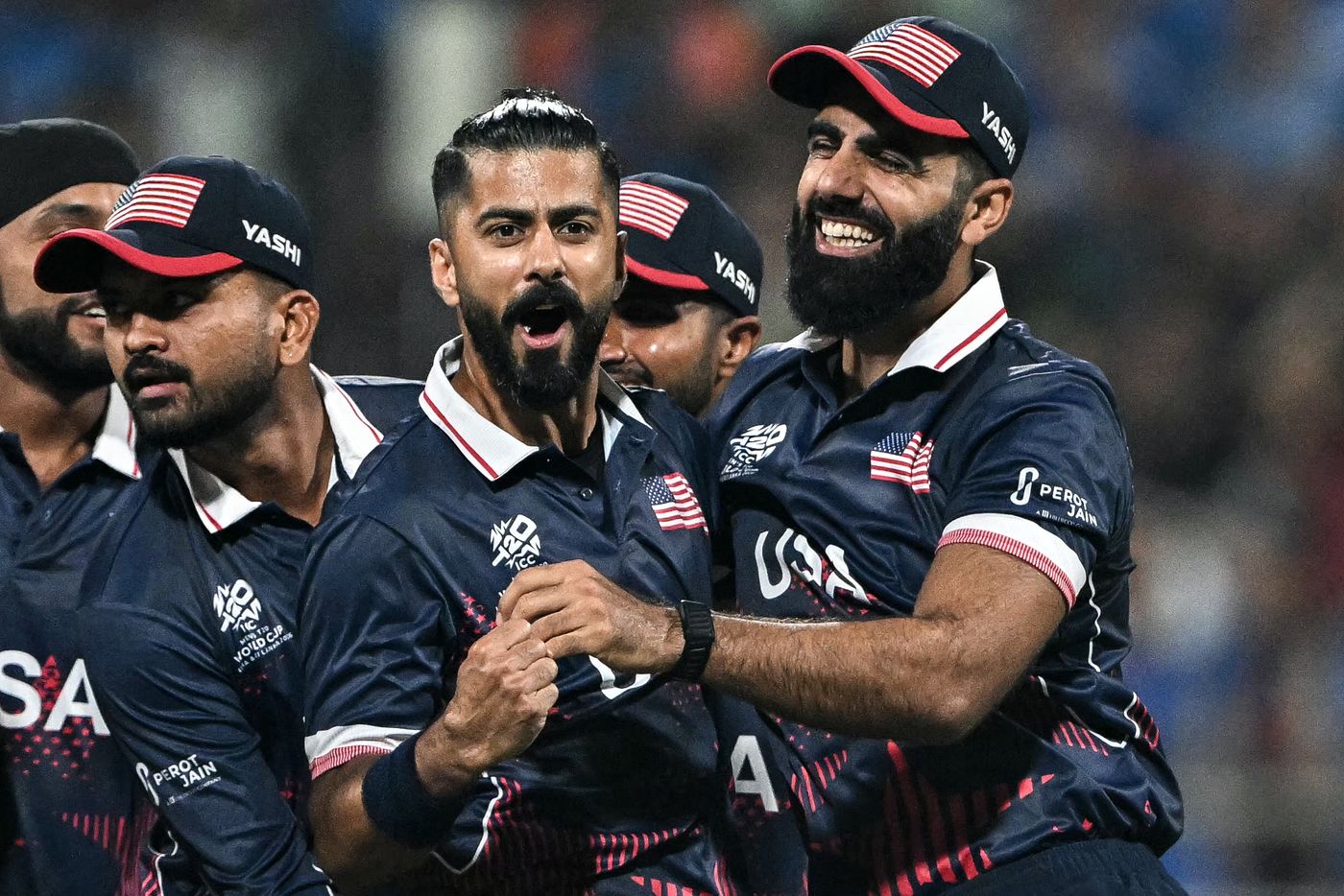 Ali Khan celebrates USA's first wicket