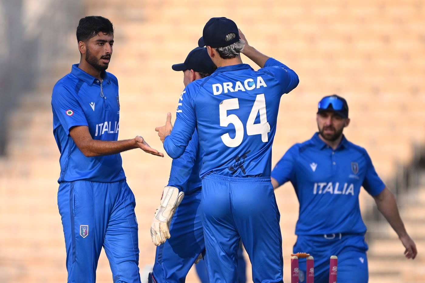 Ali Hasan celebrates a wicket with Thomas Draca