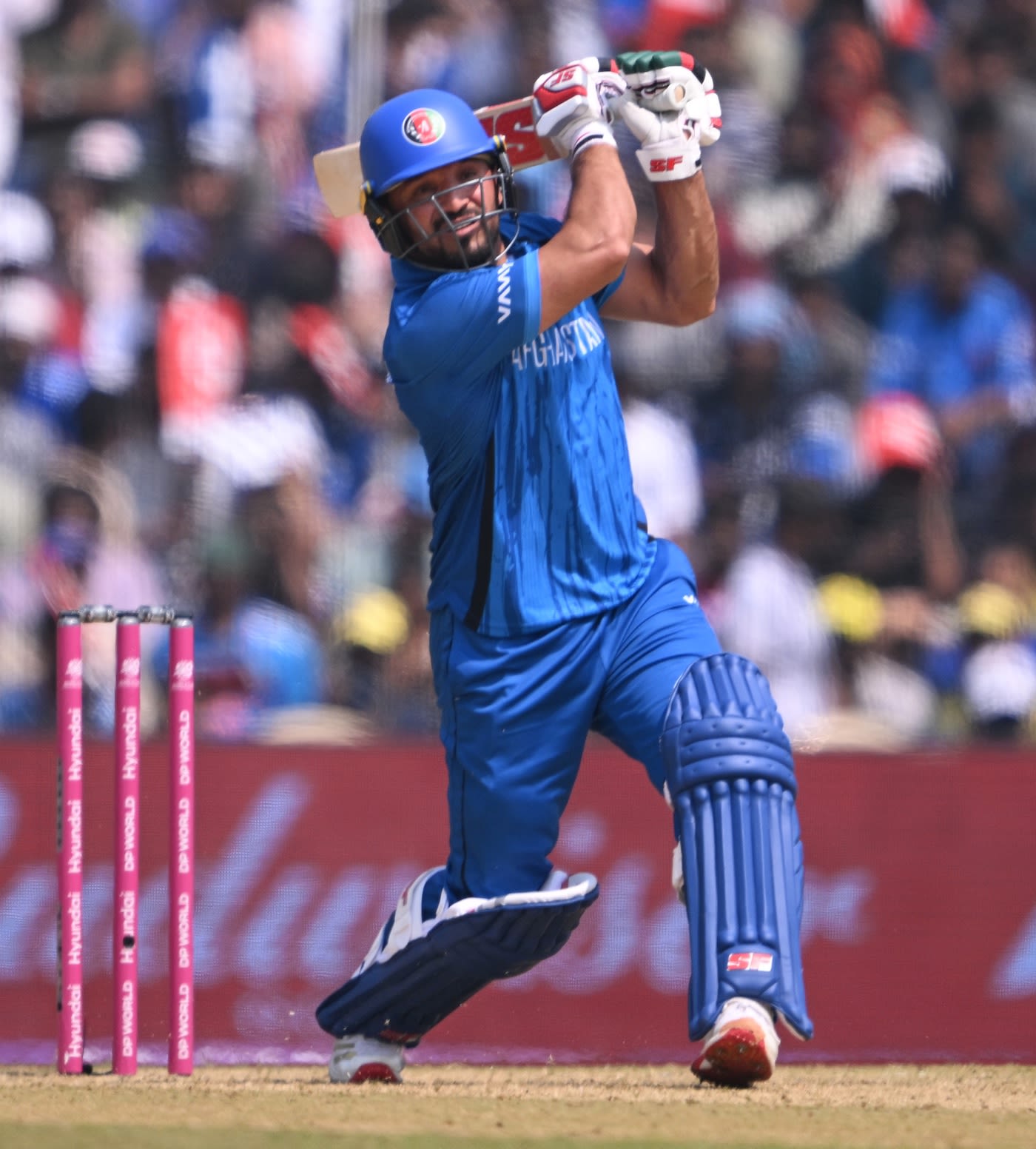 Gulbadin Naib gives the ball a good whack