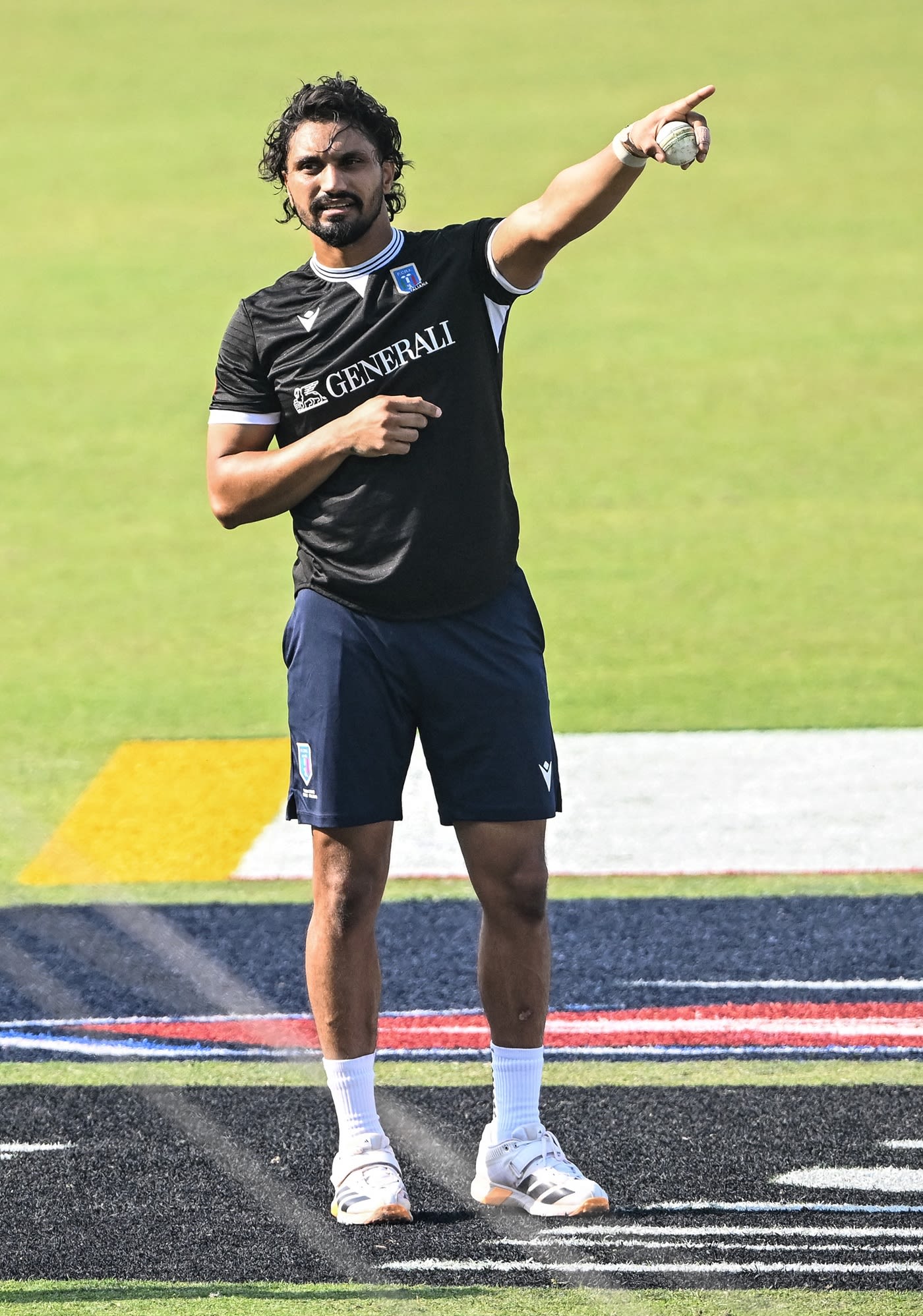 Jaspreet Singh gets ready to bowl