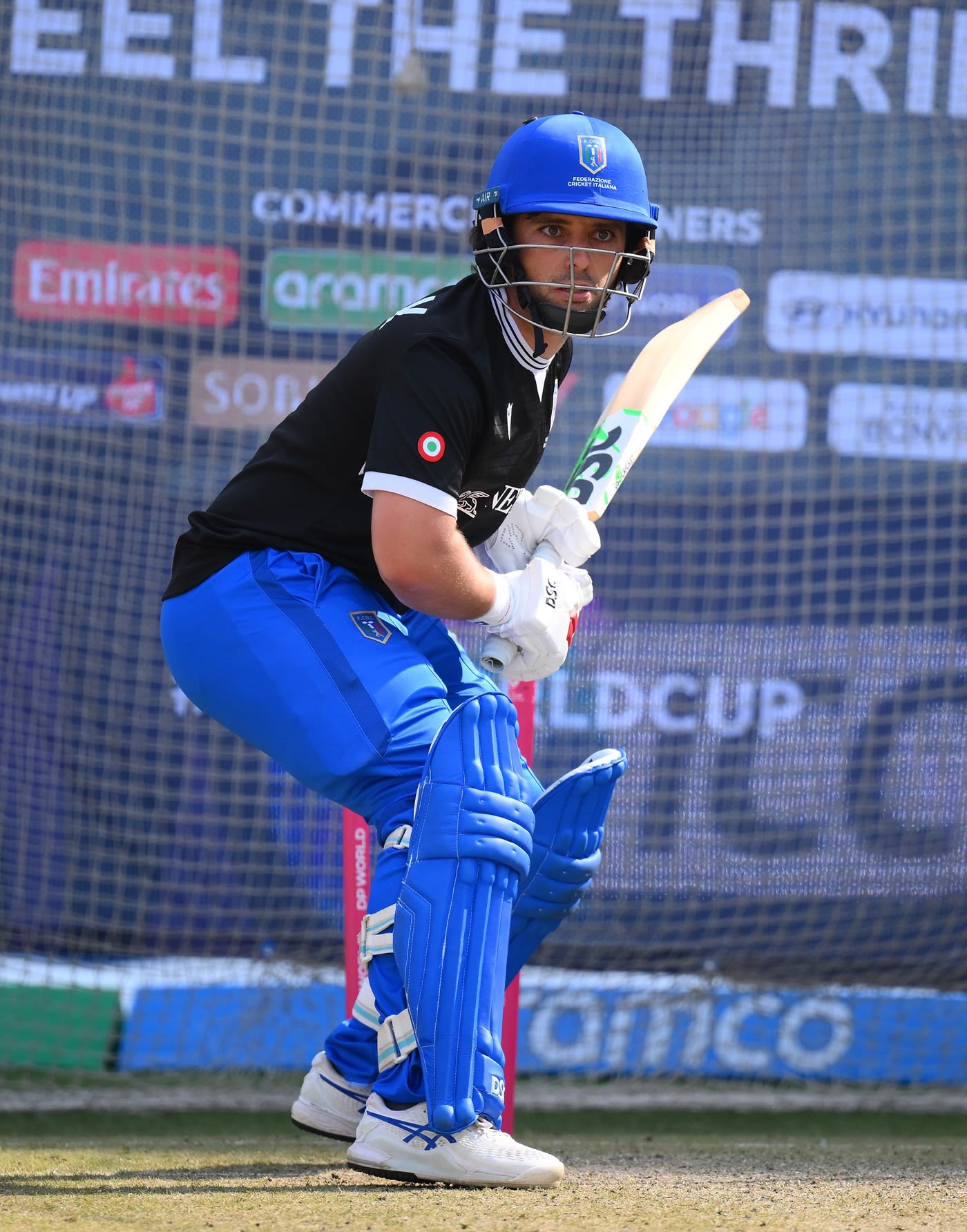 Justin Mosca bats in the nets