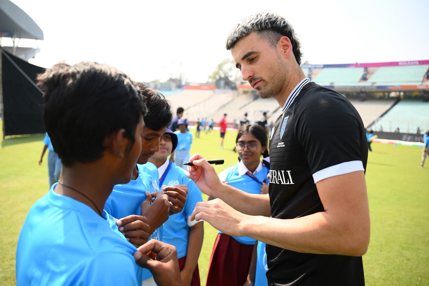 Thomas Draca signs autographs at an event