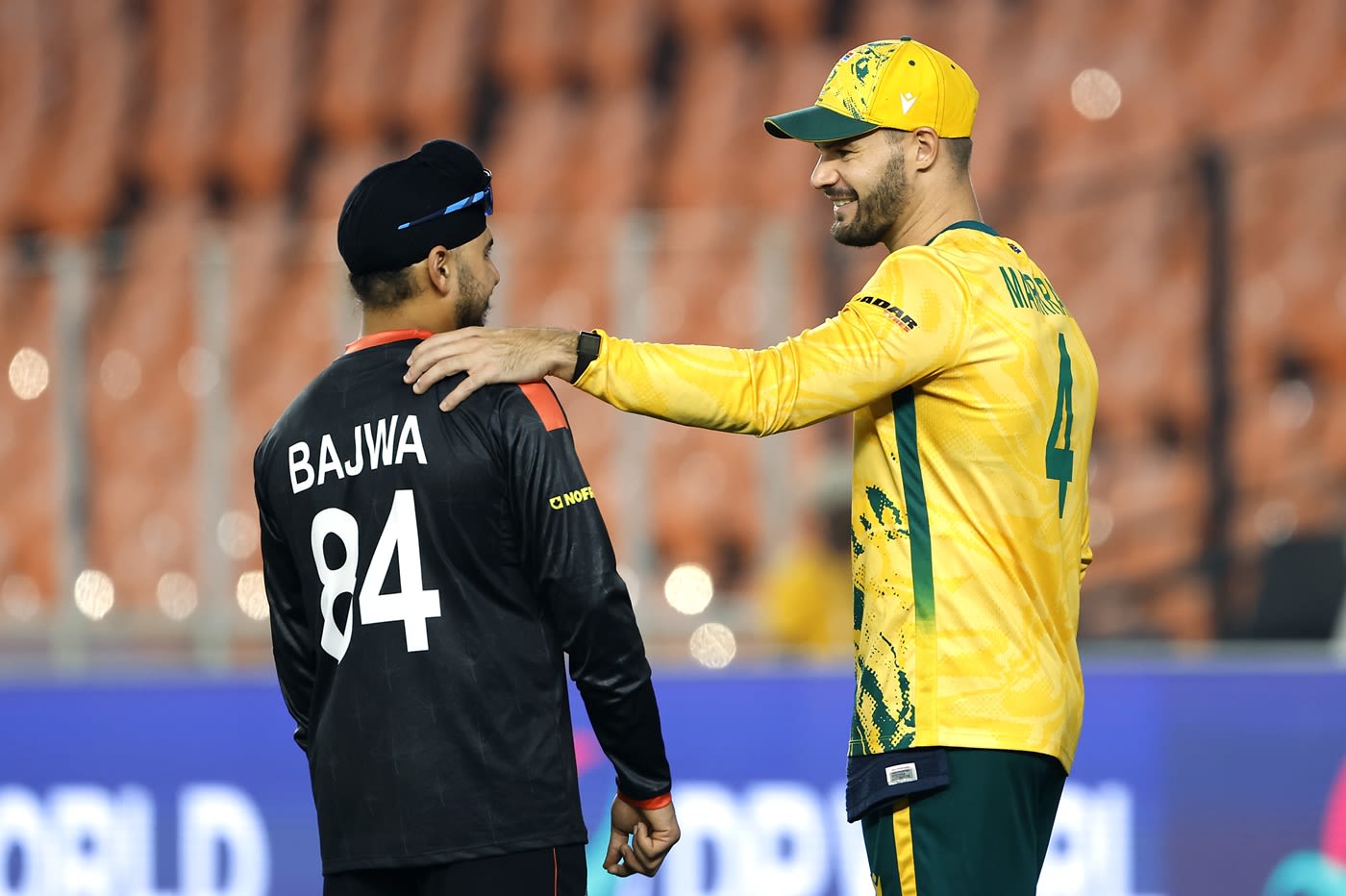 Dilpreet Bajwa enjoys a chat with Aiden Markram after the game