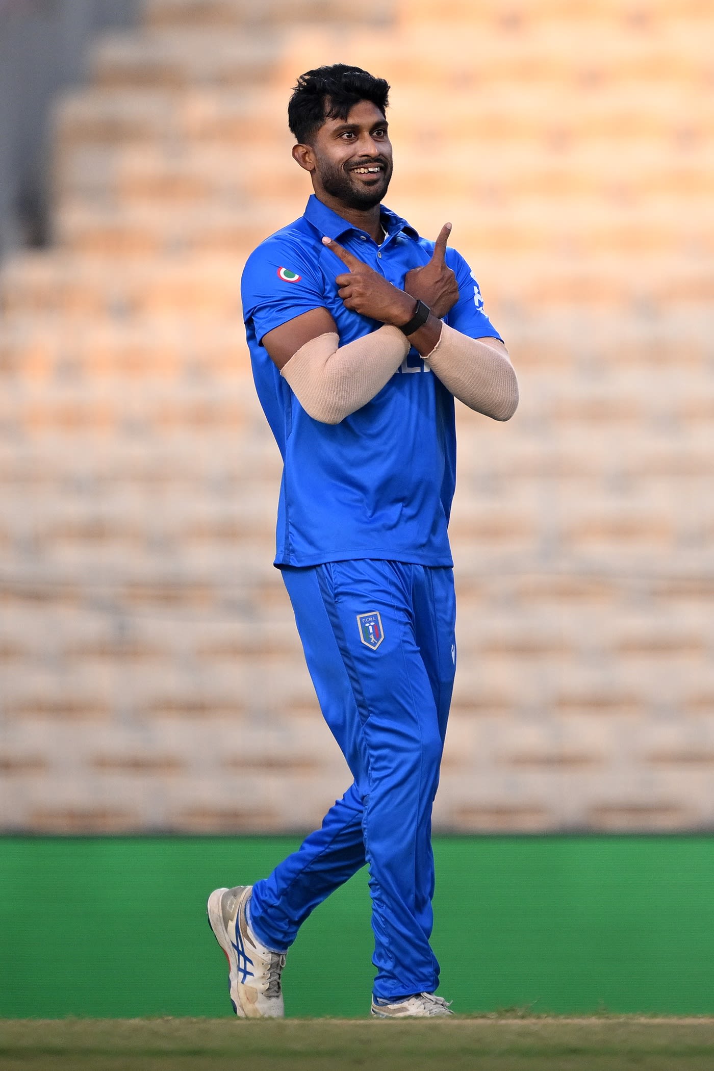 Crishan Kalugamage picked up 3 for 18 during Italy's warm-up game against UAE