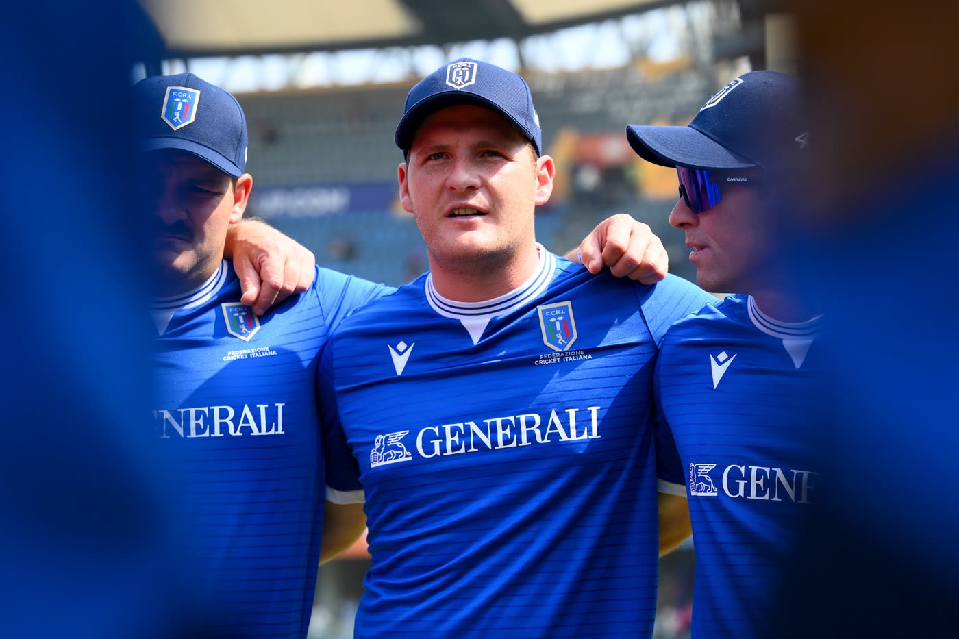 Harry Manenti leads the Italy team huddle