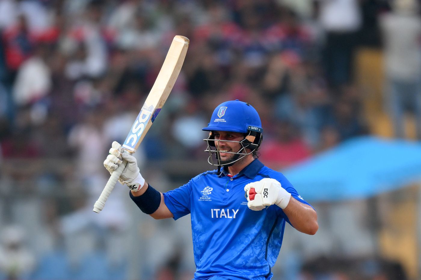 Justin Mosca celebrates his fifty