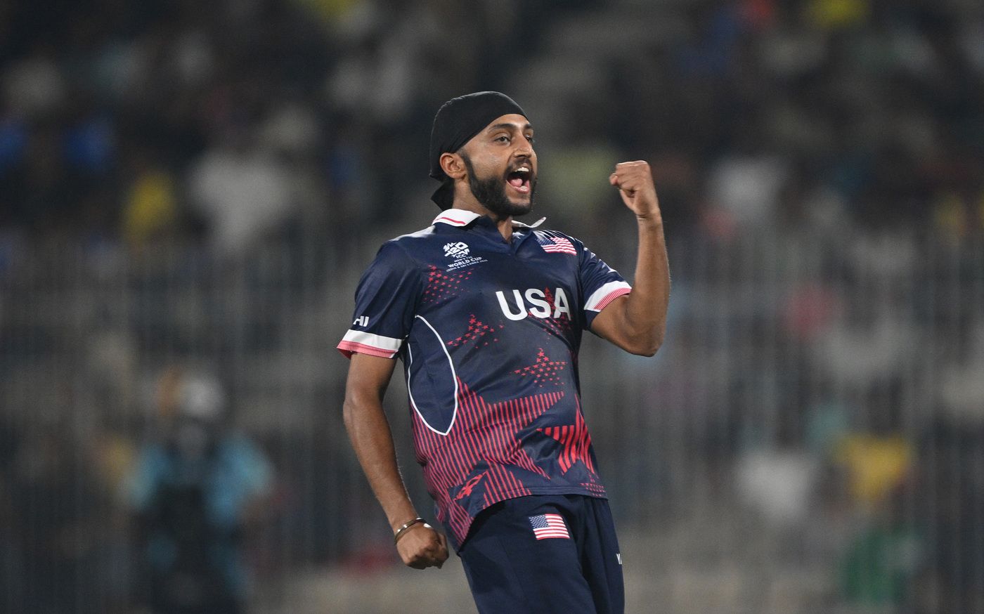 Harmeet Singh celebrates a wicket