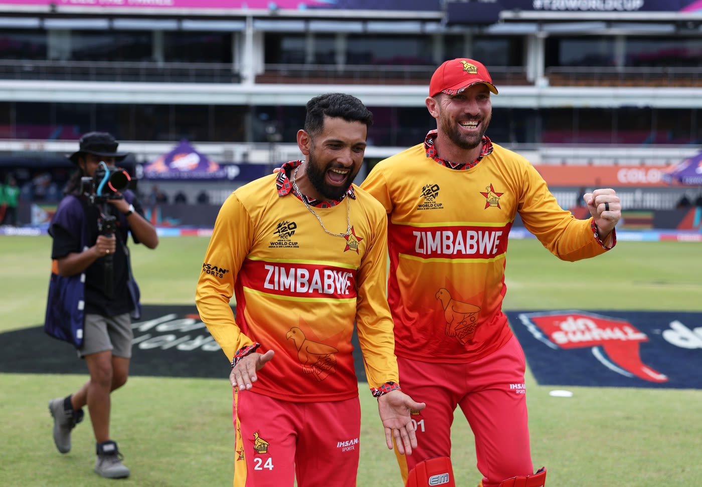 Brendan Taylor celebrates Zimbabwe's win with Sikandar Raza
