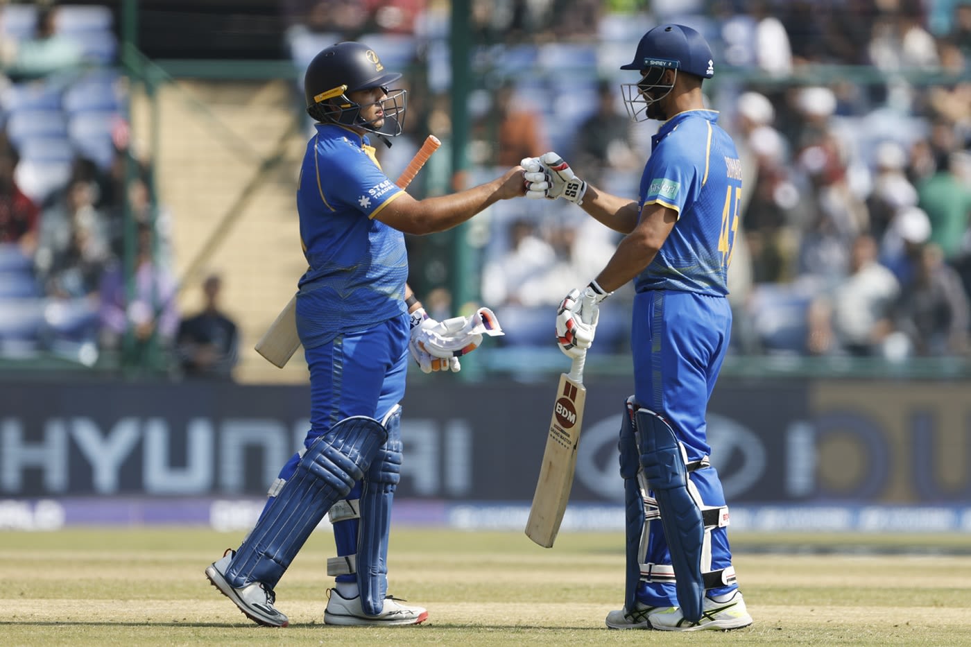 Alishan Sharafu and Sohaib Khan bump fists