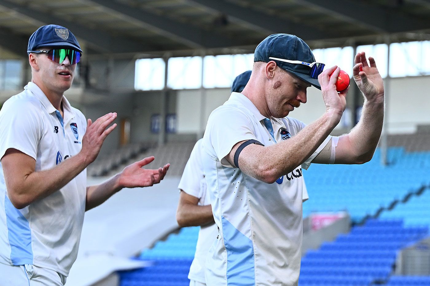Liam Hatcher walks off after a career-best 5 for 51