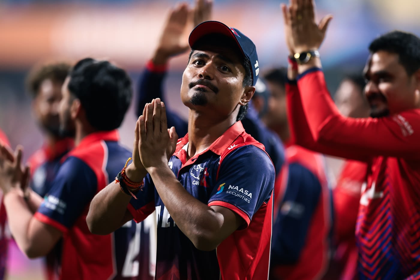 Rohit Paudel leads the Nepal team on a lap around the Wankhede