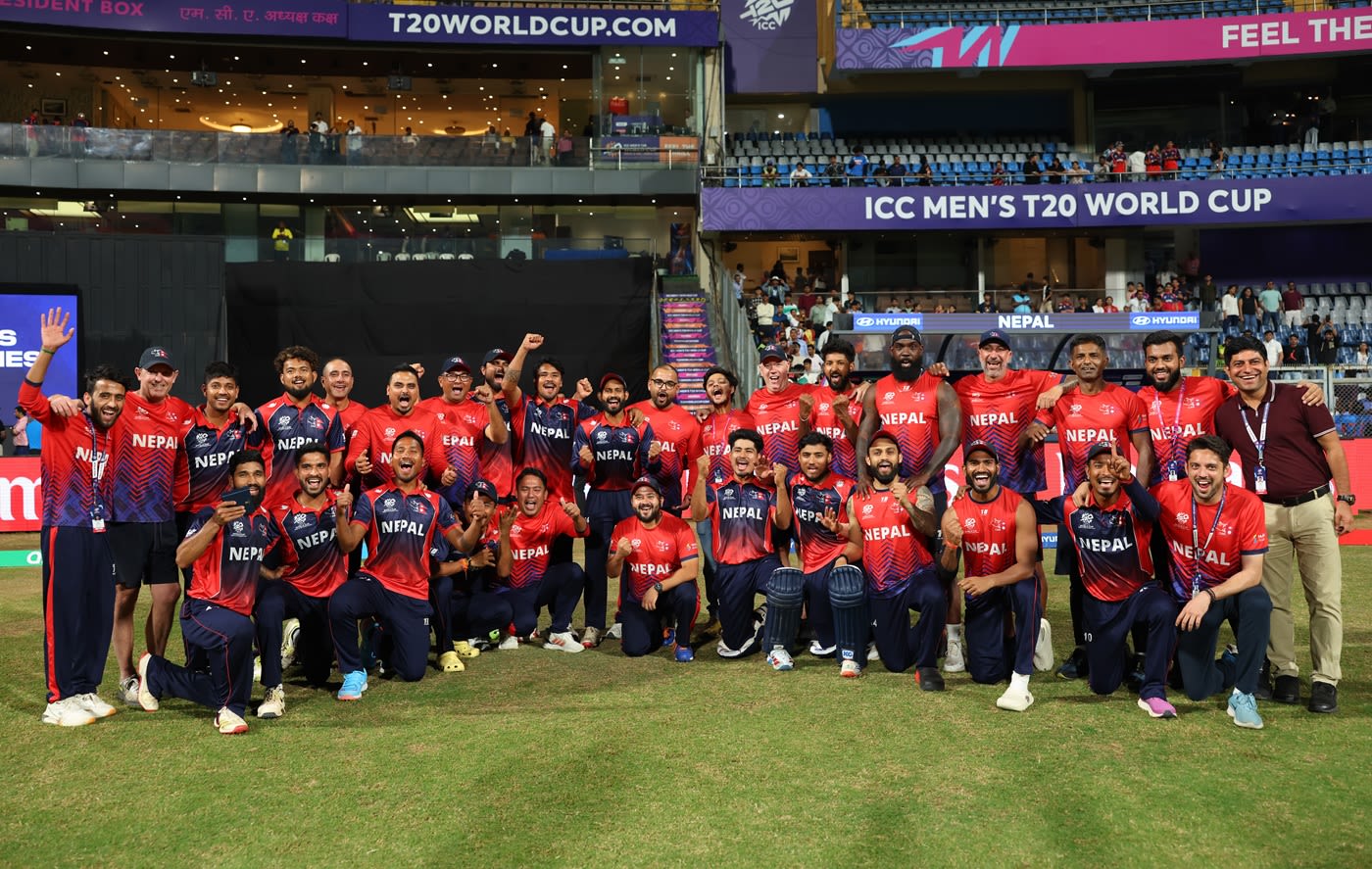 The Nepal players pose after beating Scotland