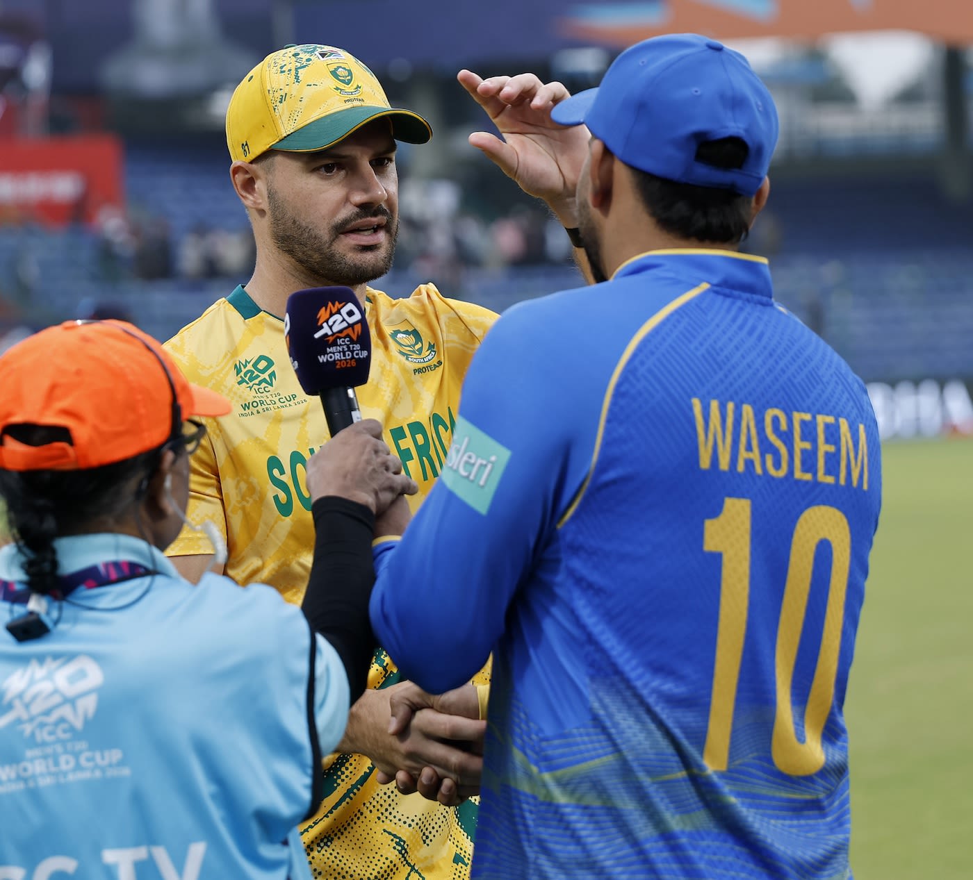 Aiden Markram and Muhammad Waseem catch up after the game