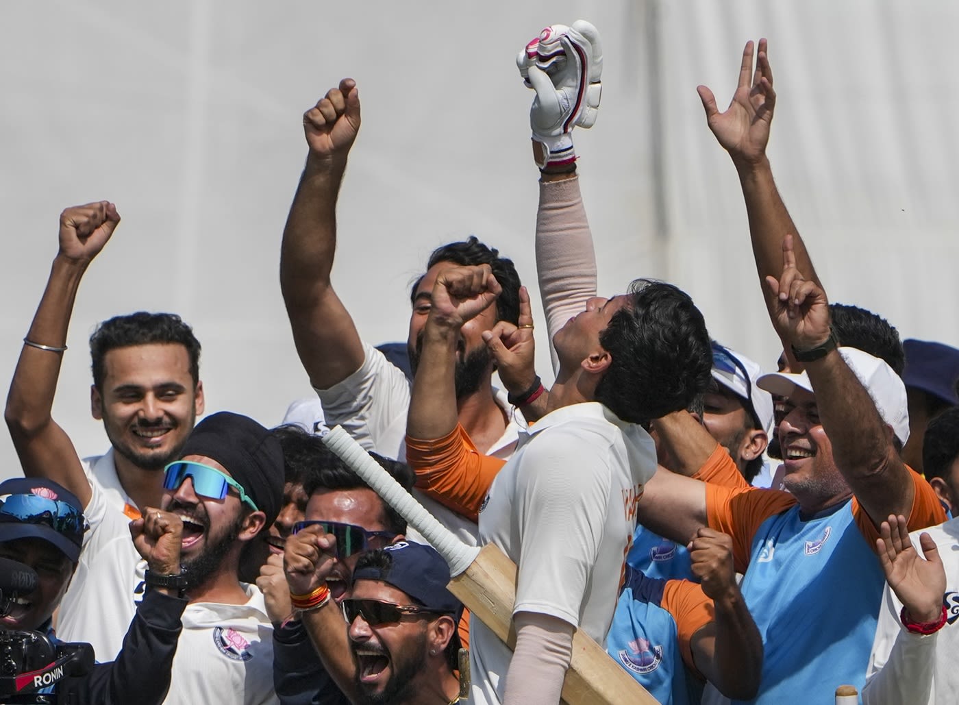 The Jammu and Kashmir players celebrate after reaching the final of the Ranji Trophy